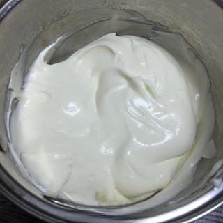 Classic Tiramisu Cake step 2: Whisk the mascarpone until smooth and creamy.