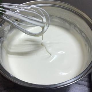 Classic Tiramisu Cake step 3: Add sugar to the heavy cream and whip until it reaches soft peaks, remaining smo