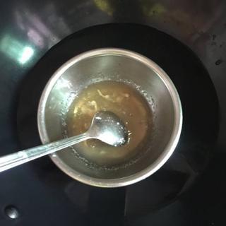 Classic Tiramisu Cake step 5: Bloom the gelatin in cold water, then gently heat until completely dissolved.