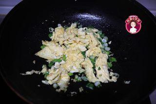 Moo Shu Pork step 6: Add a little more oil to the wok. Stir-fry the pork until it begins to change co
