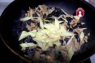 Moo Shu Pork step 9: Return the eggs to the wok, then add the cucumber slices. Season with salt to ta