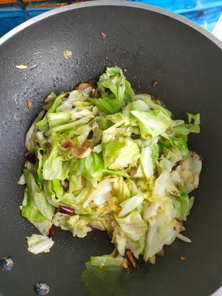Stir-Fried Cabbage with Pork step 10: Transfer to a serving plate and serve immediately.