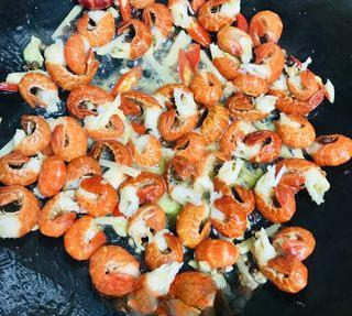 Mala Stir-Fried Soft-Shell Crab step 5: Add the green chilies and continue stir-frying until the crab begins to cook thr