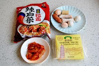 Cheesy Kimchi Ramen step 1: Prepare the ramen noodles, kimchi, fish balls, mozzarella cheese, and seaweed.