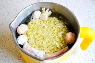 Cheesy Kimchi Ramen step 3: Add the ramen noodles and cook according to the package instructions.