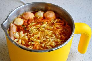 Cheesy Kimchi Ramen step 5: Cook until the noodles are almost tender and the broth is flavorful.