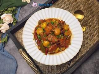Braised Chicken Wings with Chestnuts step 12: Transfer to a serving plate, garnish with chopped green onions, and serve hot.