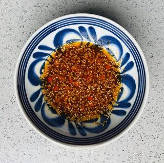 Sichuan Hot and Sour Vermicelli step 7: Add chicken bouillon powder, salt, sugar, ground Sichuan pepper, white pepper, b