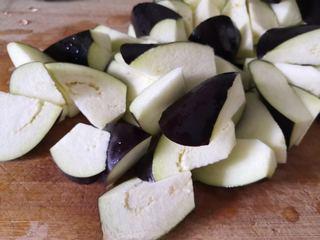 Braised Fish-Fragrant Eggplant step 1: Cut the eggplants into large bite-sized chunks.
