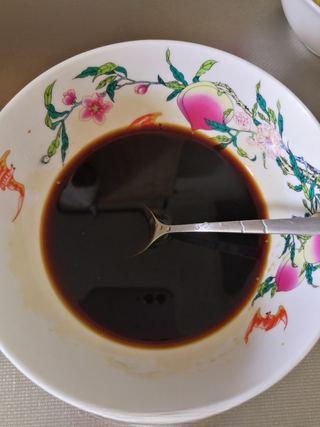 Braised Fish-Fragrant Eggplant step 6: Heat a little oil in a wok and stir-fry the pickled chili peppers and chili bean