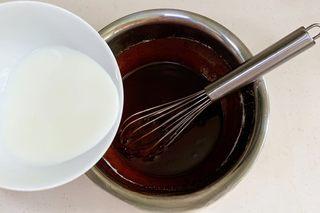 Chocolate Chiffon Cake step 6: Add the egg yolks and whisk until a smooth, lump-free batter forms.
