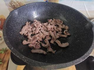 Cumin Lamb Stir-Fry with Cilantro step 10: Return the lamb to the wok and add the remaining cilantro.