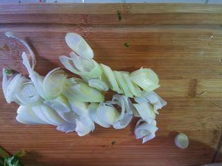 Cumin Lamb Stir-Fry with Cilantro step 8: Heat oil in a wok over medium heat. Add the lamb and quickly stir-fry until just