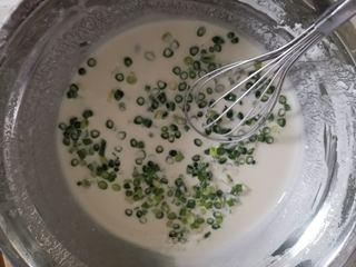Easy Scallion Egg Pancakes step 3: Stir in the chopped scallions, salt, and five-spice powder until evenly combined
