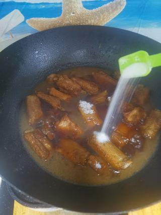 Sweet and Sour Spare Ribs step 12: Add the granulated sugar and a small pinch of salt. Continue simmering for about
