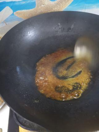 Sweet and Sour Spare Ribs step 6: Continue stirring until the caramel develops a deep golden color and fine bubble
