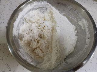 Beef Potstickers step 1: Divide the flour into two equal portions. Mix one half with 50 g boiling water t