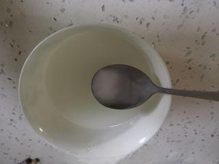 Beef Potstickers step 10: Mix the tapioca starch with 6 tablespoons of water to create a thin slurry.