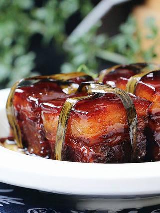 Red-Braised Pork Belly step 13: Serve hot with the rich sauce spooned over the pork.