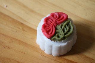 Snow Skin Mooncakes step 13: Press firmly, then gently release the mooncake from the mold.
