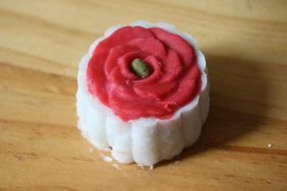 Snow Skin Mooncakes step 15: Create a variety of floral or decorative mooncake patterns.