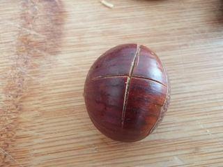 Candied Chestnuts step 3: Add a second cut to form a cross-shaped opening, helping the shells split more e
