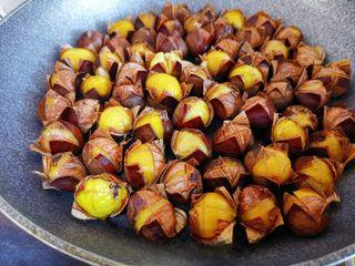 Candied Chestnuts step 6: Remove the lid and check that the shells have begun to open. Transfer the chestn