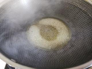 Candied Chestnuts step 7: In the same pot, combine water and sugar. Bring to a boil and cook until large b