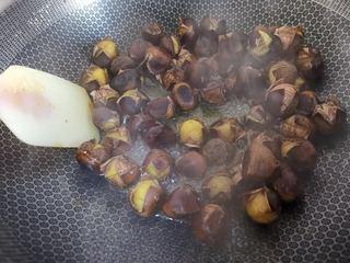 Candied Chestnuts step 8: Add the chestnuts and stir gently for about 1 minute to coat them in the syrup.