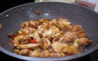 Clay Pot Basil Chicken step 6: Add the marinated chicken along with 1/4 cup soy sauce, 1 tablespoon dark soy sa