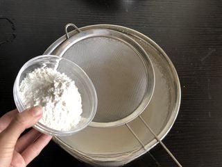 Classic Sponge Cake step 3: Sift the flour directly into the whipped egg mixture.