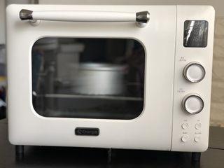 Classic Sponge Cake step 9: Remove from the oven and cool on a wire rack until warm.