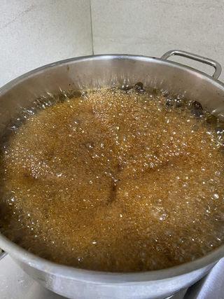 Pear Herbal Syrup step 11: Simmer gently, stirring frequently as the liquid reduces and thickens.
