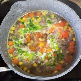 Beef, Radish and Corn Soup step 7: Season with salt and chicken bouillon powder to taste. Add the chopped scallions