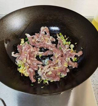 Fish-Fragrant Pork Strips step 10: Add the carrot, wood ear mushrooms, and green bell pepper. Stir-fry until just t