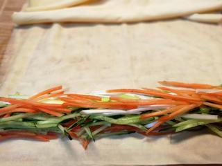 Pork Loin and Vegetable Rolls step 5: Lay the tofu sheets flat and arrange shredded cucumber, carrot, and pork strips