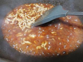 Pork Loin and Vegetable Rolls step 9: Pour in the prepared sauce and toss until the pork is evenly coated.