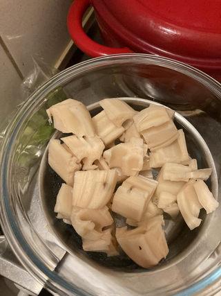 Braised Spare Ribs with Lotus Root and Mushrooms step 11: After about 55 minutes of braising, peel and cut the lotus root and carrot into