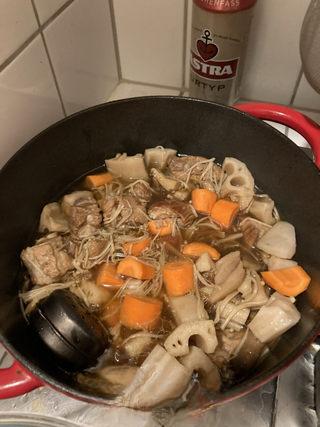 Braised Spare Ribs with Lotus Root and Mushrooms step 13: Add the carrot pieces and cook for another 5 minutes until tender.