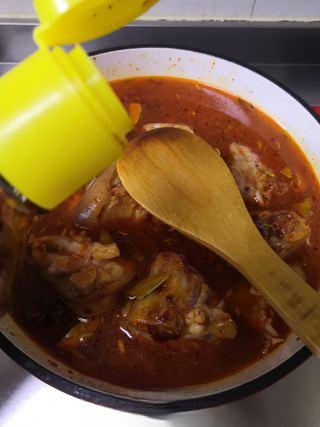 Braised Pork Trotters step 10: Add dark soy sauce and light soy sauce.