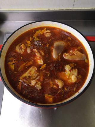 Braised Pork Trotters step 11: Add additional water if needed until the pork trotters are fully submerged. Brin
