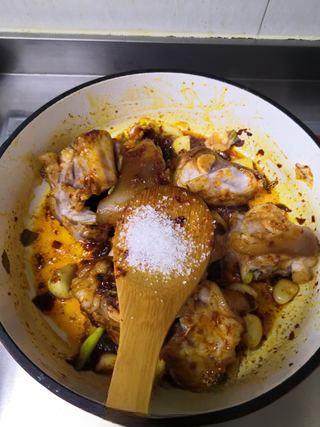 Braised Pork Trotters step 8: Add sugar and stir briefly.