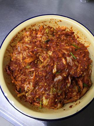Fruit Kimchi with Napa Cabbage step 19: Fold and roll the cabbage neatly, then place it into a clean airtight container.