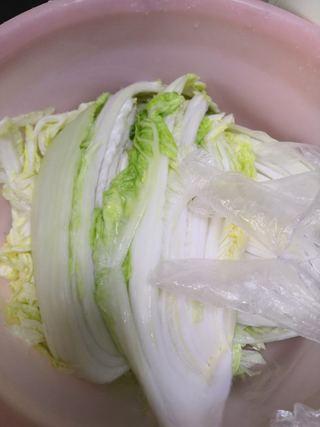 Fruit Kimchi with Napa Cabbage step 9: Rinse the salted cabbage briefly to remove excess salt, then drain thoroughly an