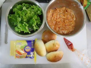 Louisiana Chicken Cheeseburger step 4: Prepare the burger ingredients by washing the lettuce, separating the buns, arra