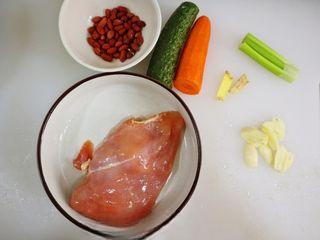 Kung Pao Chicken step 1: Prepare the chicken breast, cucumber, peanuts, carrot, green onion, ginger, and 