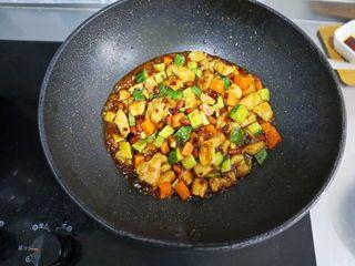Kung Pao Chicken step 10: Pour in the prepared sauce and cook for about 1 minute until everything is evenl