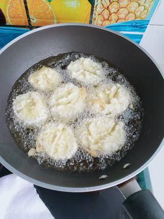 Crispy Fried Stuffed Eggplant step 12: Heat oil to about 325°F (160°C) and carefully add the eggplant pieces. Fry slowl
