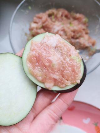 Crispy Fried Stuffed Eggplant step 7: Spread a layer of pork filling onto one eggplant slice.