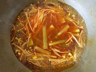 Spicy and Numbing Fish Hotpot step 14: Briefly blanch the bamboo shoots, keeping them crisp.